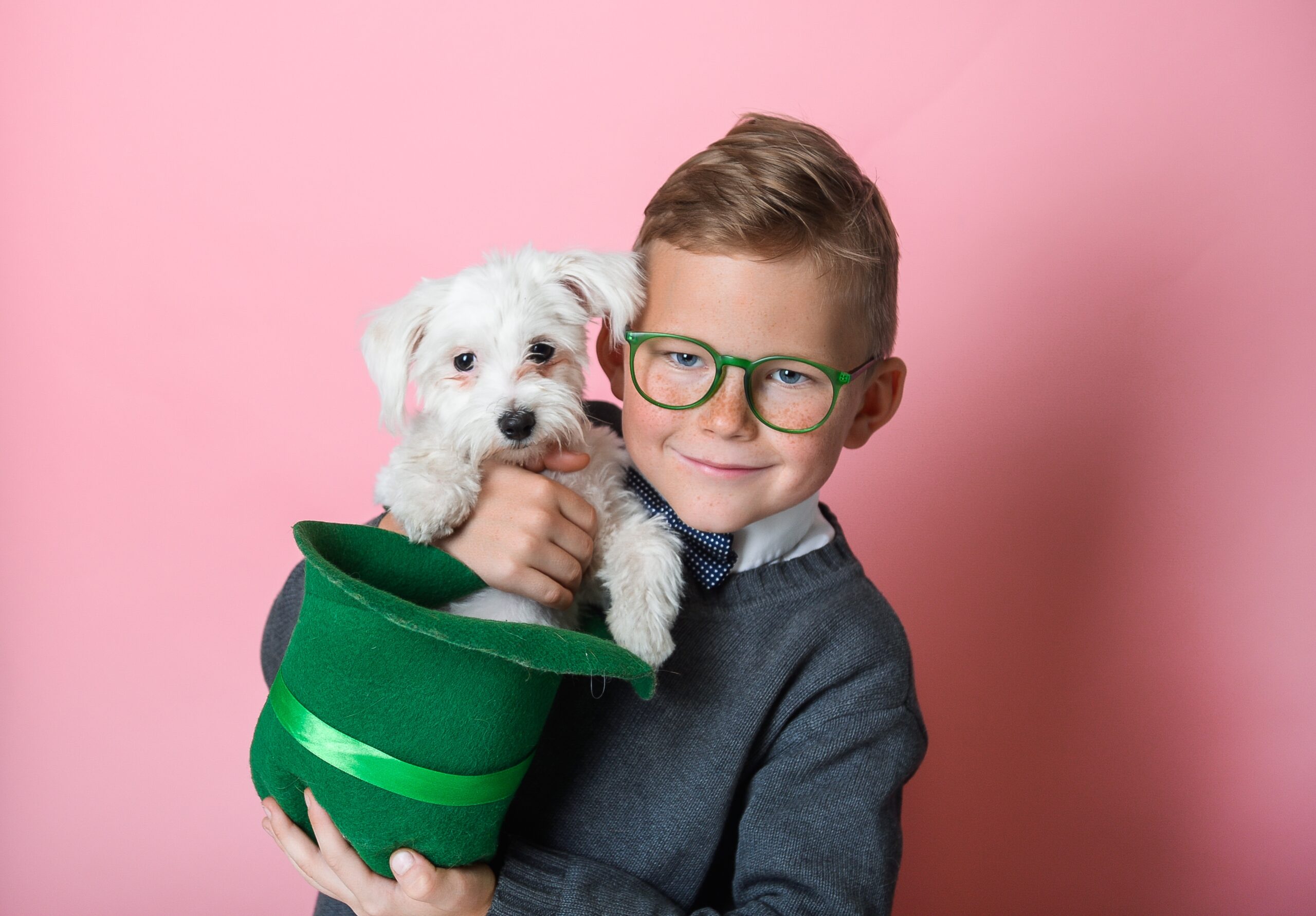 funny,little,boy,with,green,hat,with,little,white,dog
